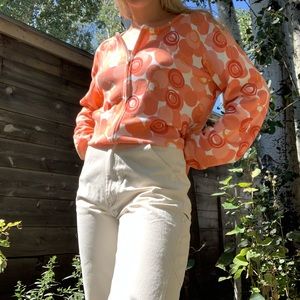 70’s style orange/peach zip up cardigan